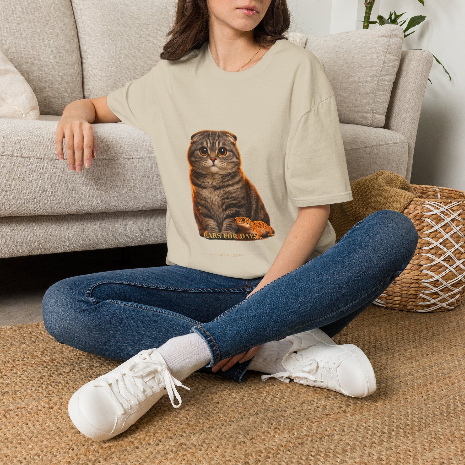 Scottish Fold — Ears For Days — photoreal cat breed portraits paired with tiny gecko compani. Gold Gecko Co. Cats & Geckos collection.