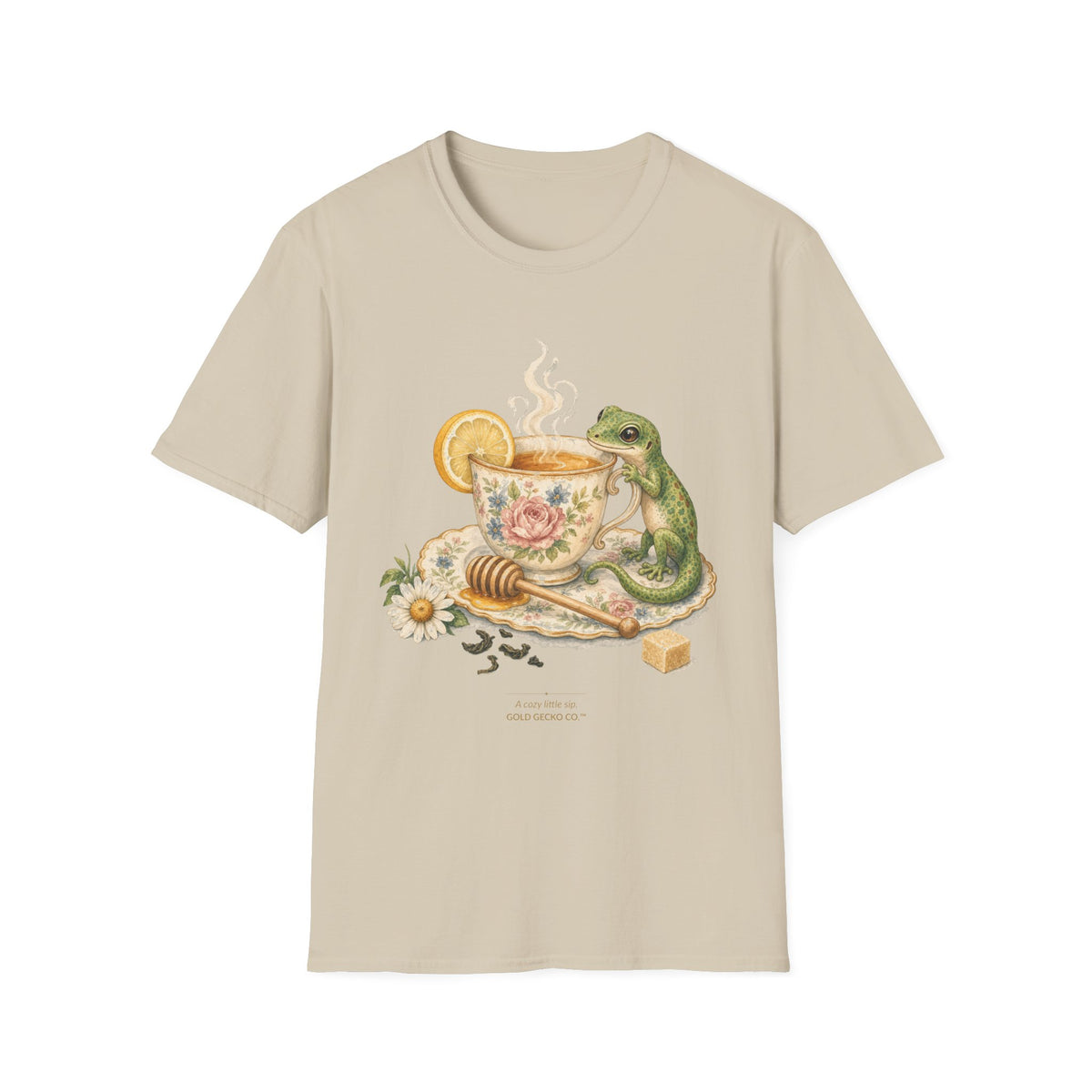 Tea Time Gecko cottagecore watercolor T-shirt from Gold Gecko Co. — gecko sipping from a floral teacup among daisies and lavender.