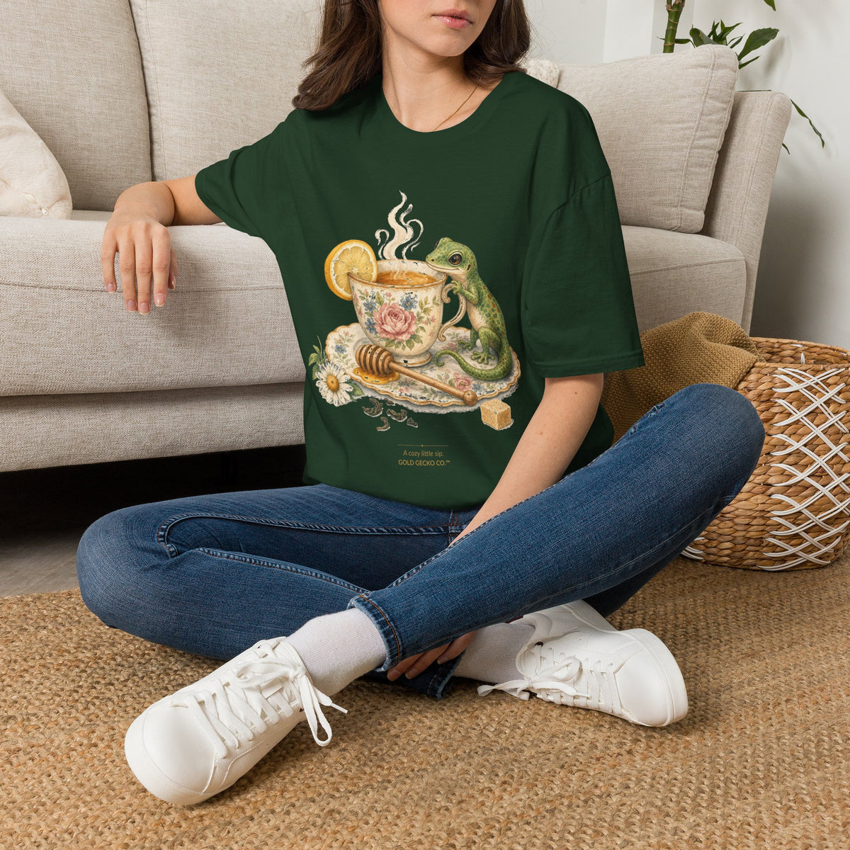 Tea Time Gecko cottagecore watercolor T-shirt from Gold Gecko Co. — gecko sipping from a floral teacup among daisies and lavender.