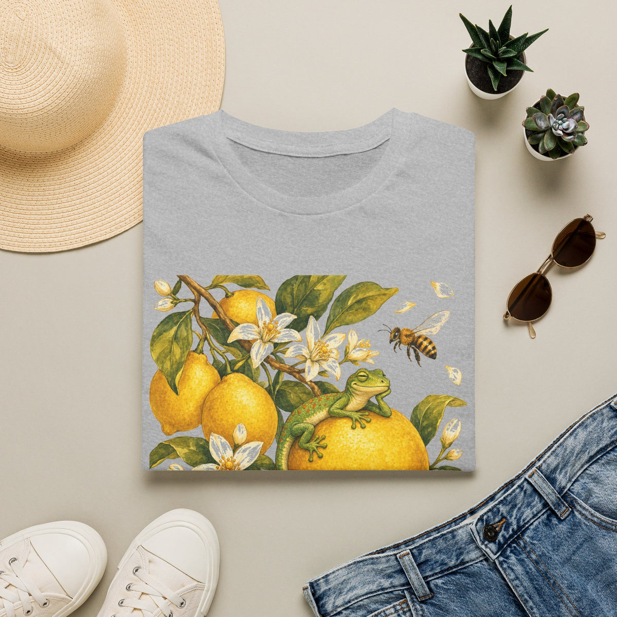 Citrus Grove Gecko cottagecore watercolor T-shirt from Gold Gecko Co. — gecko in a sunlit Mediterranean citrus grove of lemons and oranges.