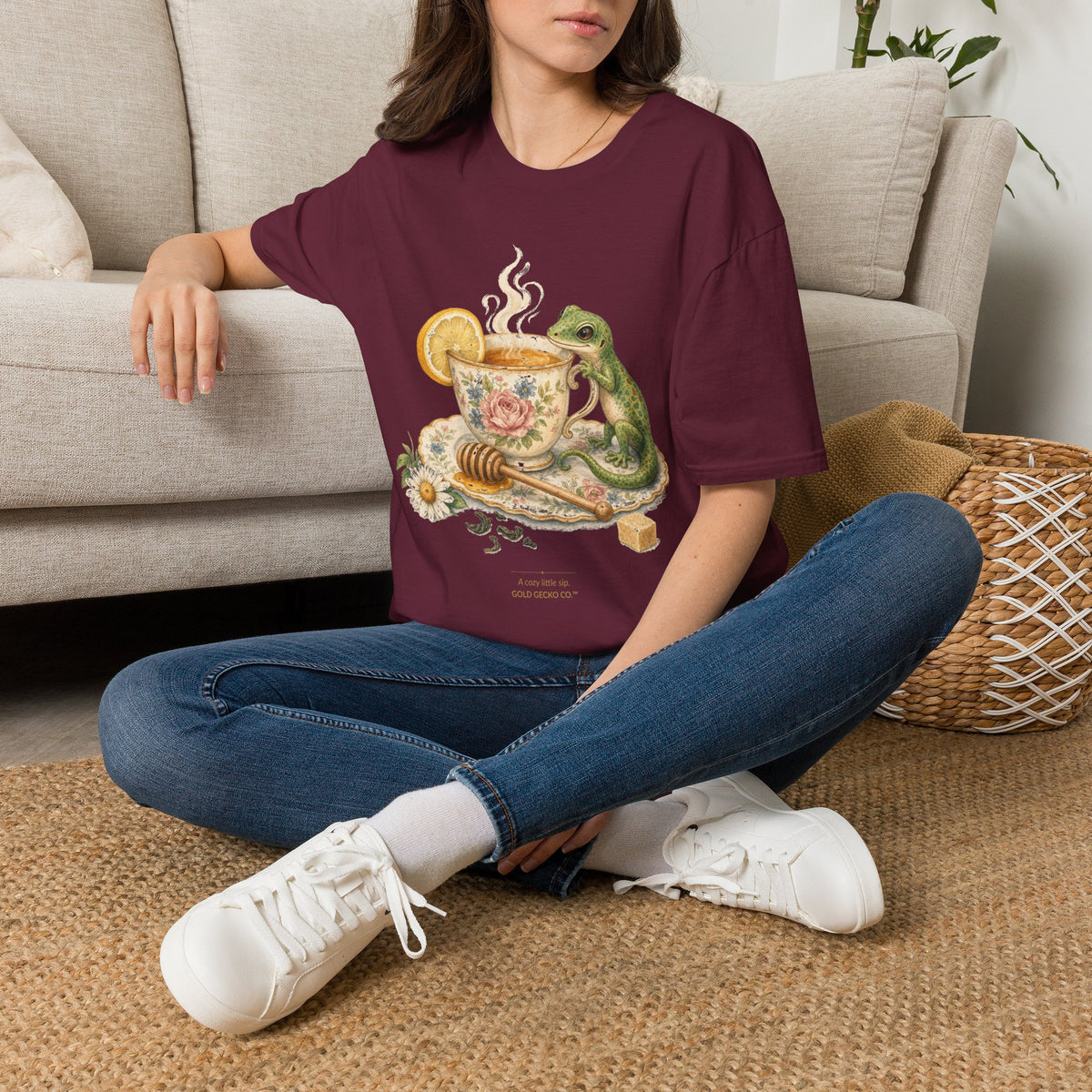 Tea Time Gecko cottagecore watercolor T-shirt from Gold Gecko Co. — gecko sipping from a floral teacup among daisies and lavender.