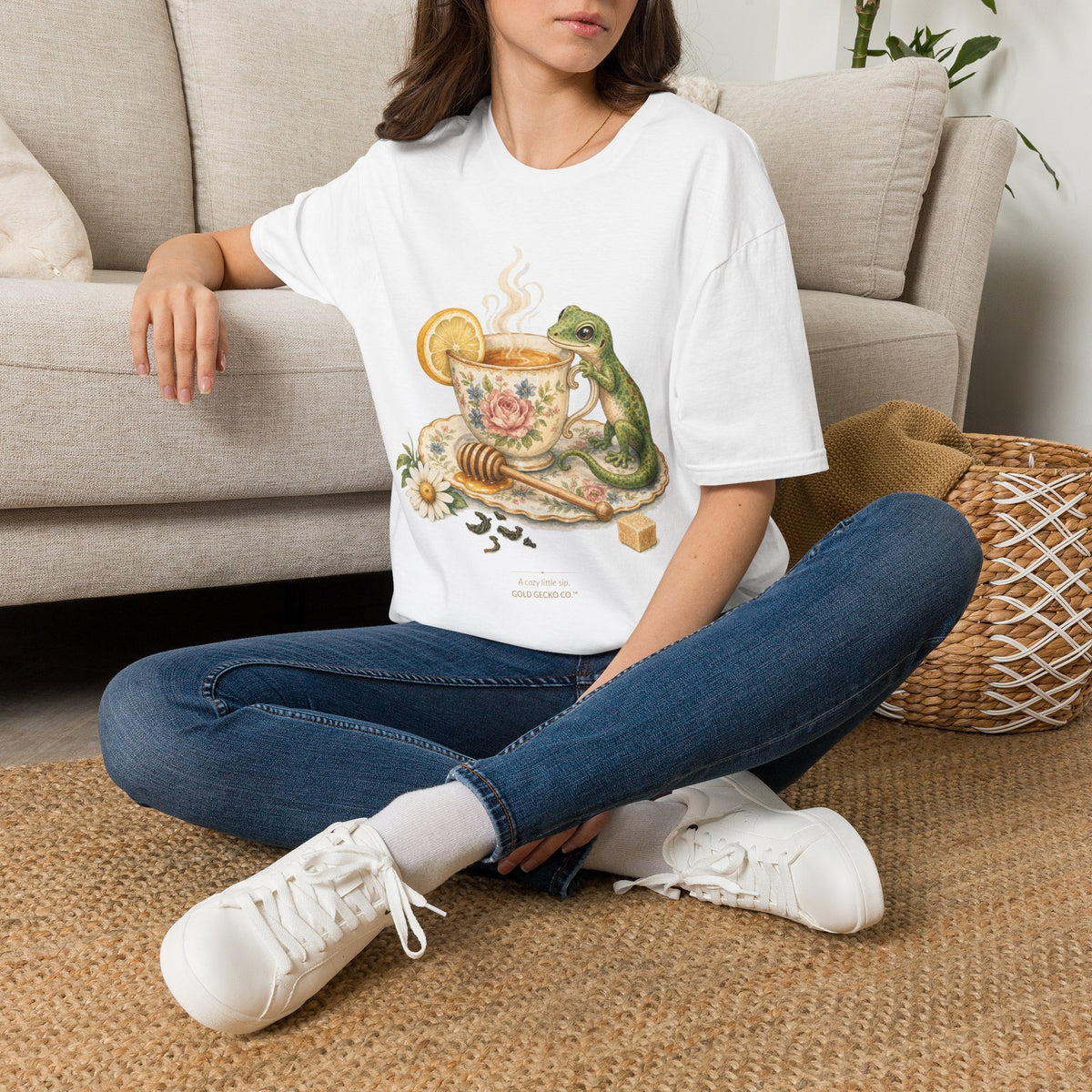 Tea Time Gecko cottagecore watercolor T-shirt from Gold Gecko Co. — gecko sipping from a floral teacup among daisies and lavender.