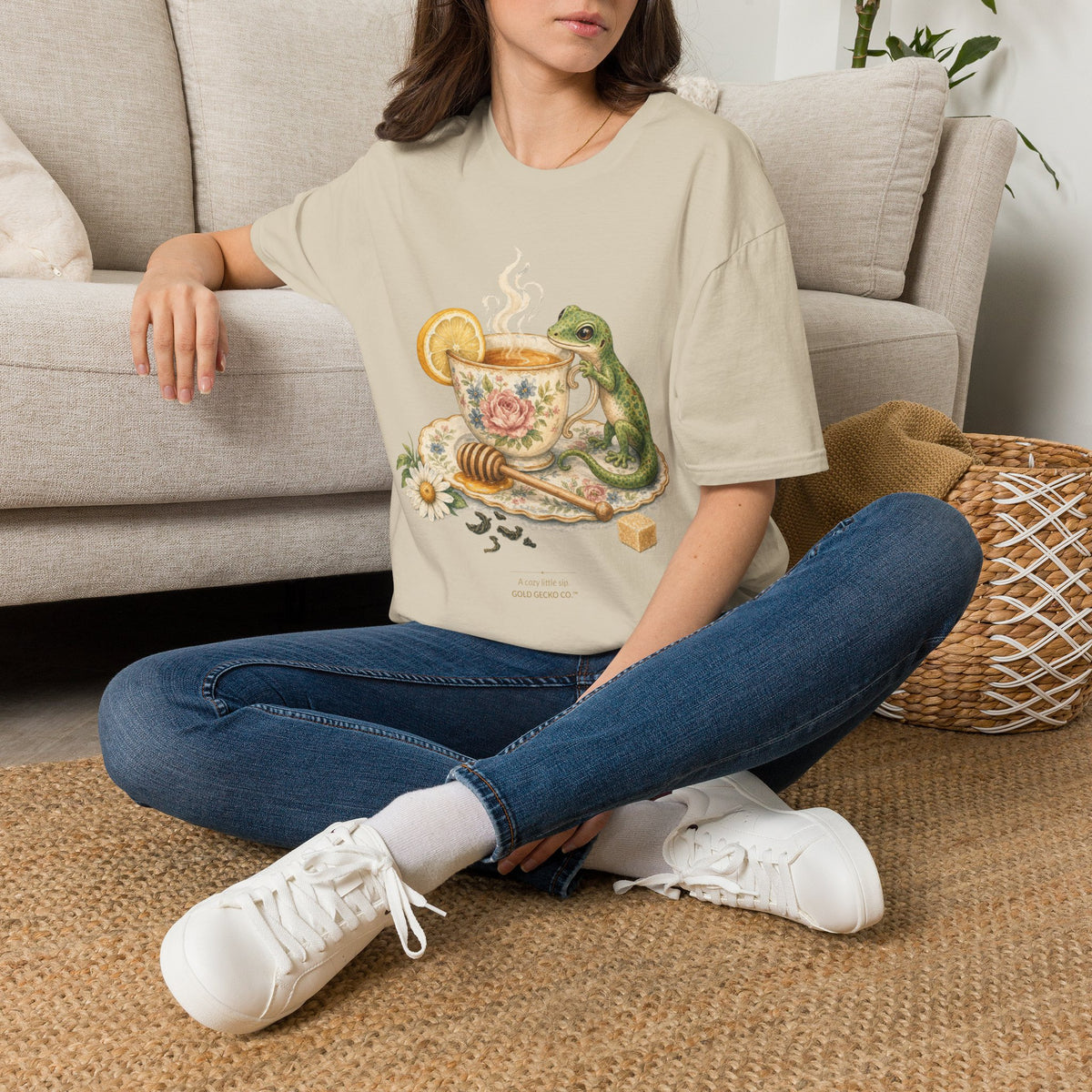 Tea Time Gecko cottagecore watercolor T-shirt from Gold Gecko Co. — gecko sipping from a floral teacup among daisies and lavender.