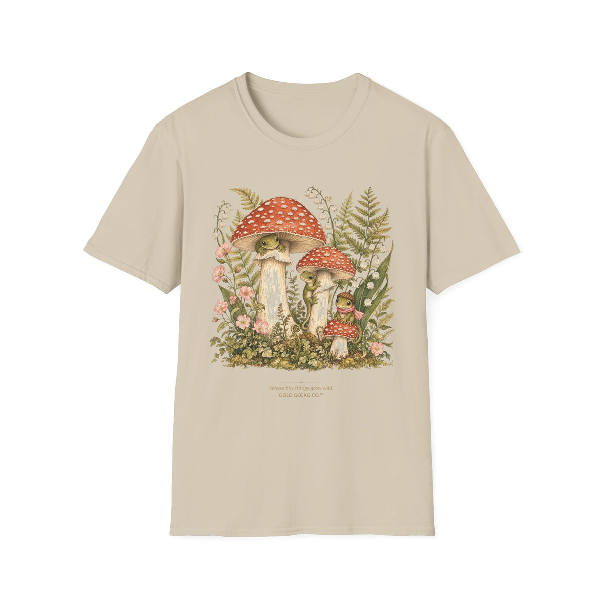 Mushroom Village cottagecore watercolor T-shirt from Gold Gecko Co. — gecko exploring a whimsical toadstool village in the woods.
