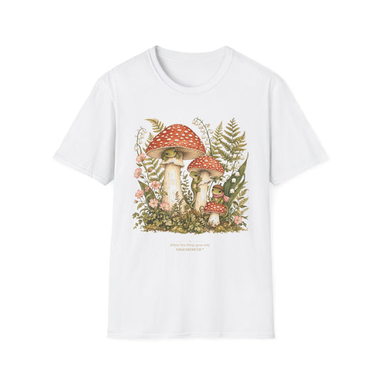 Mushroom Village cottagecore watercolor T-shirt from Gold Gecko Co. — gecko exploring a whimsical toadstool village in the woods.